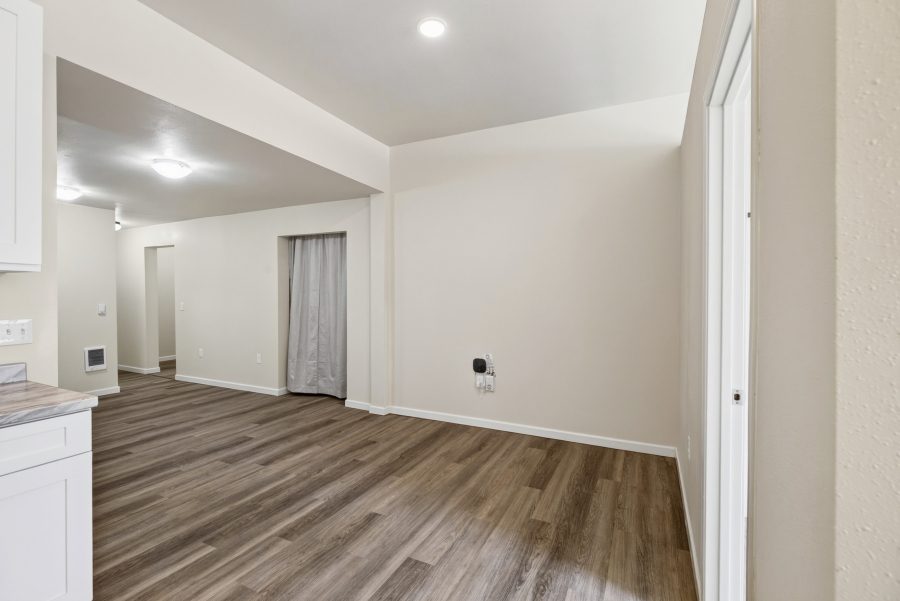 Unit 2 dining area opening through to the living room